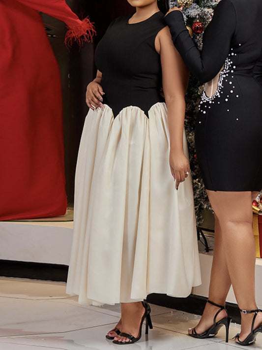Demure Black & White Sleeveless Dress